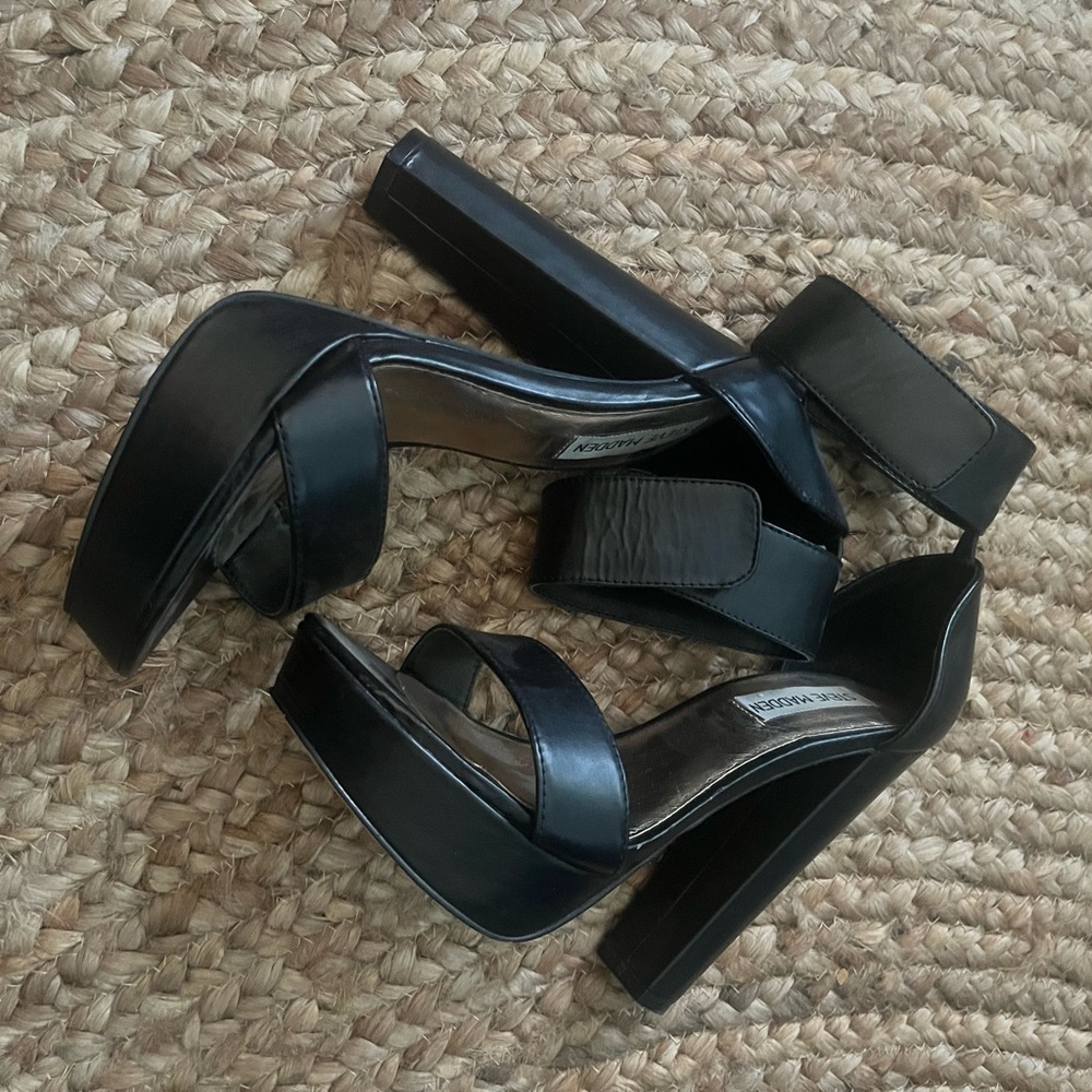Steve Madden black leather platform heel.